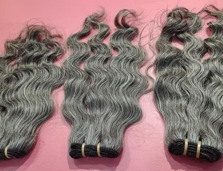 Extensions à clipser indiennes bouclées brutes