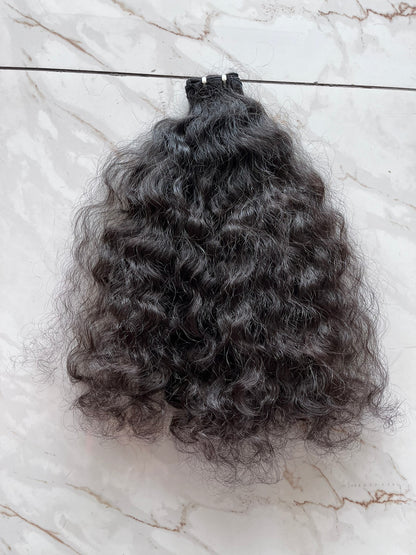 Trames - Cheveux indiens bouclés bruts 