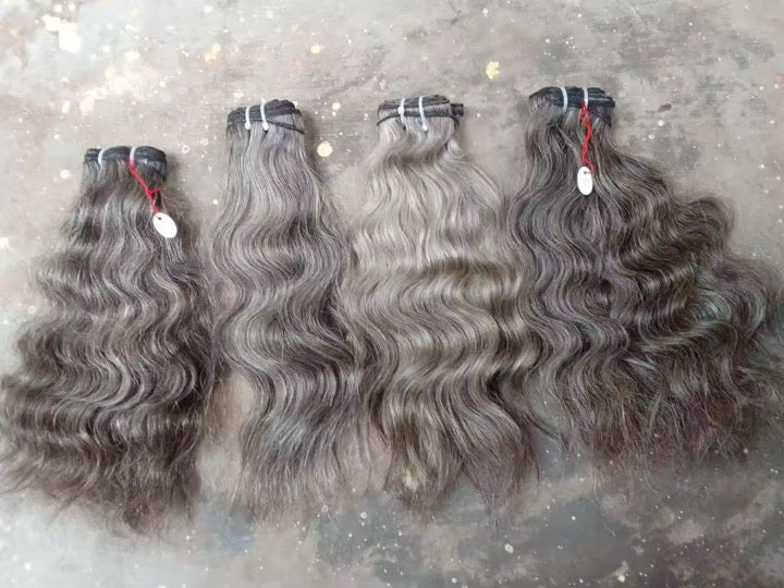 Extensions à clipser indiennes bouclées brutes 